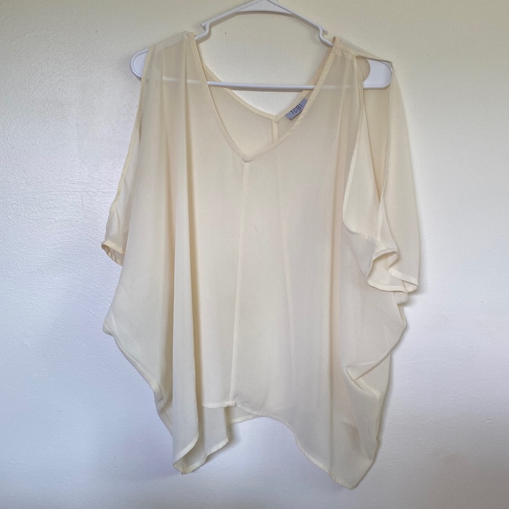 Tobi sheer cream colored blouse with slit sleeves